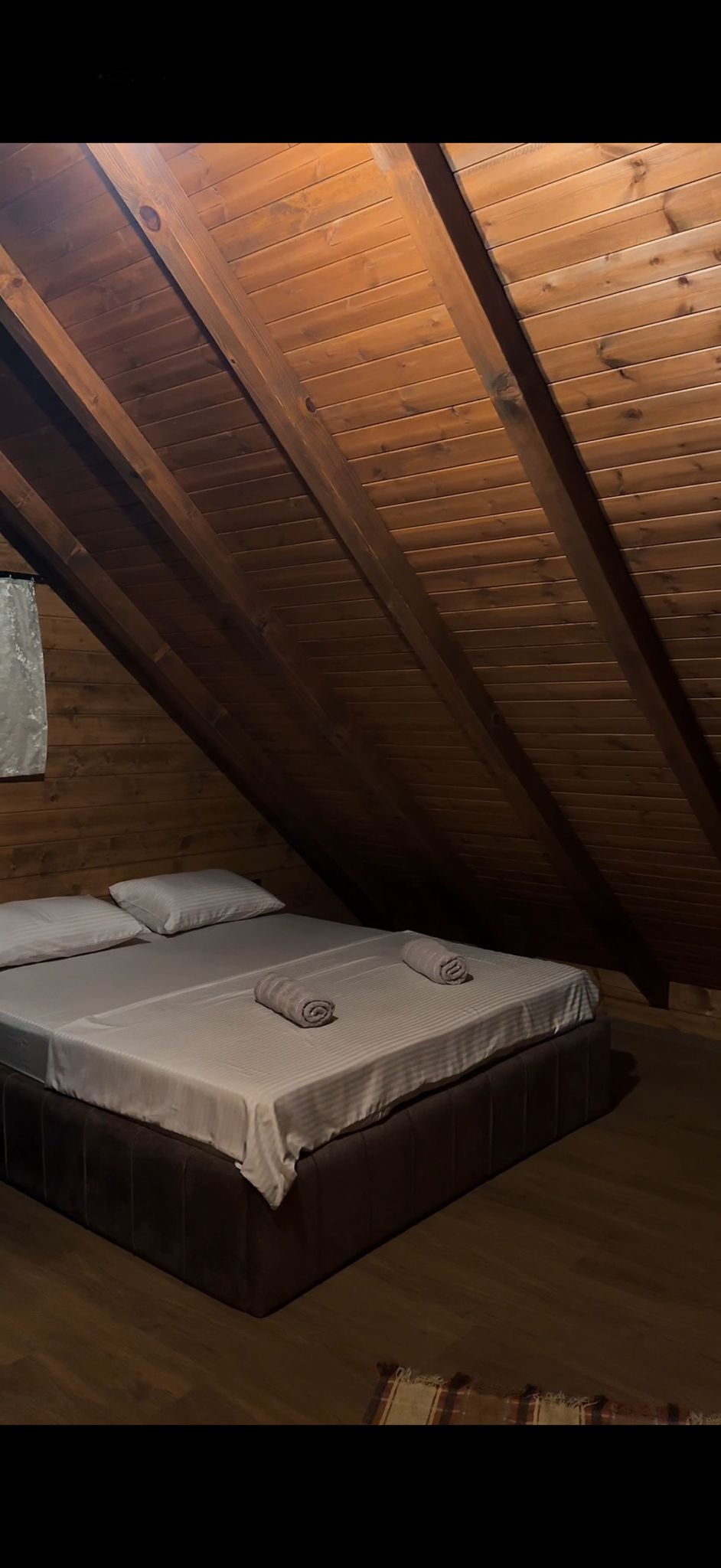 Double bedroom with timber ceiling at Villa Lavanda