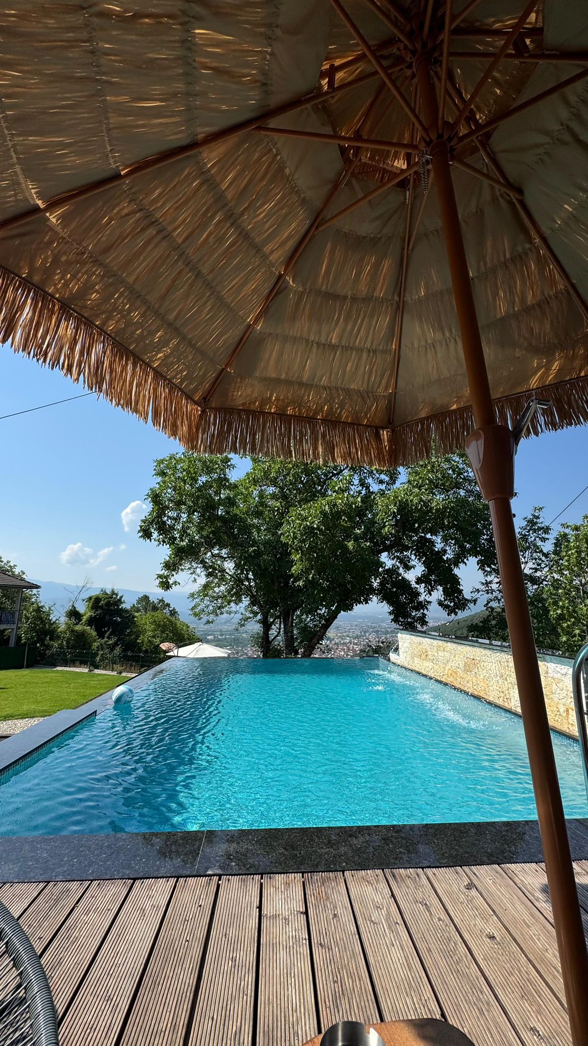 Pool with mountain and city views at Villa Lavanda